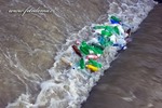 Thumbnail Plastic bottles in the stream
